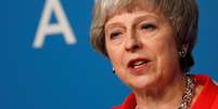 A primeira-ministra britânica, Theresa May, disse que ainda estará no cargo dentro de duas semanas, rejeitando especulações de que pode renunciar se perder uma importante votação sobre o Brexit no Parlamento   Foto: Reuters