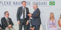 O presidente Michel Temer e o presidente eleito Jair Bolsonaro participaram da cerimônia de lançamento do submarino Riachuelo, no Complexo Naval de Itaguaí, litoral sul do Rio de Janeiro  Foto: CÉSAR SALES/AGÊNCIA O DIA / Estadão