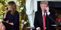 Crian&ccedil;as ao redor dos Estados Unidos conversam com o presidente Trump e a primeira-dama Melania na noite de Natal  Foto: Reuters / BBC News Brasil