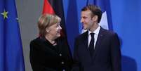 Merkel e Macron assinam acordo para enfrentar desafios da UE  Foto: ANSA / Ansa - Brasil