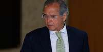 O ministro da economia, Paulo Guedes, durante cerimônia de assinatura do decreto que flexibiliza a posse de armas no Brasil  Foto: Walterson Rosa / Framephoto / Estadão