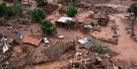 Tanto a barragem de Mariana (MG), que se rompeu em 2015, quanto a barragem de Brumadinho (MG), eram classificadas como de 'baixo risco' de rompimento nos registros da Agência Nacional de Mineração  Foto: CHRISTOPHE SIMON/AFP / BBC News Brasil