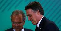 Presidente Jair Bolsonaro e o ministro da Economia, Paulo Guedes, em cerimônia no Palácio do Planalto, em Brasília 07/01/2019 REUTERS/Adriano Machado  Foto: Adriano Machado / Reuters