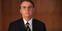 O presidente Jair Bolsonaro, durante vídeo com pronunciamento sobre a demissão do ex-ministro da Secretaria-Geral da Presidência, Gustavo Bebianno  Foto: Reprodução/WhatsApp / Estadão Conteúdo