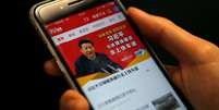 Propaganda do governo chinês em smartphone
18/02/2019 
REUTERS/Tingshu Wang  Foto: Reuters