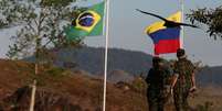 Fronteira entre países
  Foto: Bruno Kelly/Reuters / BBC News Brasil