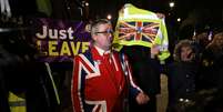 Manifestante pró-Brexit protesta do lado de fora do Parlamento britânico
12/03/2019
REUTERS/Kevin Coombs  Foto: Reuters