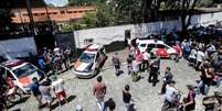 O ataque a tiros na escola estadual Professor Raul Brasil, em Suzano, na Grande São Paulo, nesta quarta-feira chocou o Brasil e o mundo  Foto: EPA/SEBASTIAO MOREIRA / BBC News Brasil