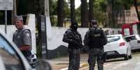 Policiais em frente à escola Raul Brasil após tiroteio em Suzano (SP)
13/03/2019
REUTERS/Amanda Perobelli  Foto: Reuters