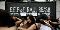 Estudantes e moradores participam de um abraço simbólico em homenagem às vítimas de ataque na escola Raul Brasil, em Suzano
15/03/2019
REUTERS/Ueslei Marcelino  Foto: Reuters