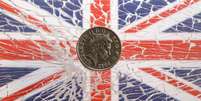 Moeda de libra sobre bandeira do Reino Unido em vidro quebrado
28/01/2019
REUTERS/Dado Ruvic  Foto: Reuters