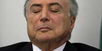 Temer fica em silêncio durante interrogatório na PF  Foto: ANSA / Ansa