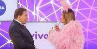 Silvio Santos alfinetou Claudia Leitte após a polêmica no 'Teleton': 'Enche o saco!'  Foto: Divulgação, SBT / PurePeople