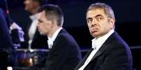 Ator Rowan Atkinson, conhecido pelo papel de Mr Bean  Foto: Kai Pfaffenbach / Reuters