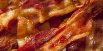 Uma fatia de presunto ou bacon tem cerca de 23 g de carne processada  Foto: Getty Images / BBC News Brasil