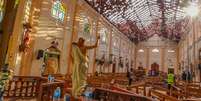 Interior e telhado destruídos da igreja de São Sebastião na cidade de Negombo, ao norte de Colombo, no Sri Lanka  Foto: DW / Deutsche Welle