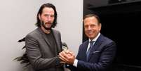 O ator Keanu Reeves e o governador de S&atilde;o Paulo, Jo&atilde;o Doria.  Foto: Instagram / @jdoriajr / Estad&atilde;o Conte&uacute;do