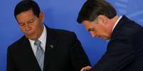 Presidente Jair Bolsonaro e vice-presidente Hamilton Mourão participam de cerimônia no Palácio do Planalto
25/04/2019
REUTERS/Adriano Machado  Foto: Reuters