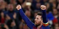 Messi comemora o terceiro gol contra o Liverpool  Foto: Albert Gea / Reuters