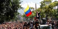 Juan Guaidó usou o Twitter para convocar novos protestos em 1º de maio  Foto: Carlos Garcia Rawlins / Reuters