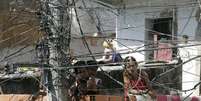 Emaranhado de fios em poste de eletricidade no Rio de Janeiro 
19/08/2008
REUTERS/Bruno Domingos  Foto: Reuters
