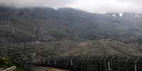 Cerca entre a Síria e Israel em Golan Heights  Foto: Ammar Awad / Reuters