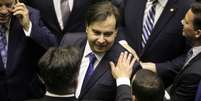 Líderes do centrão fizeram um acordo com o presidente da Câmara, Rodrigo Maia (DEM-RJ), para votar MP 870  Foto: SERGIO LIMA/AFP/Getty Images / BBC News Brasil