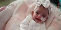 Ivy Worsley é hoje uma menina saudável de nove meses  Foto: Laura Worsley / BBC News Brasil
