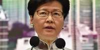 Carrie Lam anuncia suspensão de proposta que permitiria extradição para China continental  Foto: AFP / BBC News Brasil