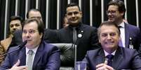 Deputado Rodrigo Maia e Bolsonaro na Câmara dos Deputados  Foto: Câmara dos Deputados / via Reuters
