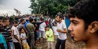 Migrantes em acampamento na fronteira entre Sérvia e Hungria, em julho de 2016  Foto: EPA / Ansa - Brasil