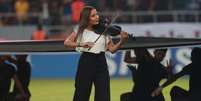 A violinista Joelle Saade toca o hino nacional do Iraque durante abertura do Campeonato da Federação de Futebol da Ásia Ocidental em Kerbala, no Iraque
30/07/2019
REUTERS  Foto: Reuters