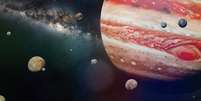Planeta Júpiter com alguns do 69 conhecido luas com a galáxia  Foto: iStock