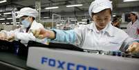 A maioria dos iPhones e outros dispositivos da Apple s&atilde;o montados na Foxconn, fabricante do grupo taiwan&ecirc;s Hon Hai Precision  Foto: Getty Images / BBC News Brasil