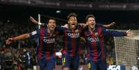 Luis Suárez, Neymar e Lionel Messi comemoram gol em partida do Barcelona no Camp Nou
11/01/2015
REUTERS/Albert Gea  Foto: Reuters