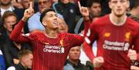 Firmino comemora gol marcado contra o Chelsea (Foto: AFP)  Foto: Lance!