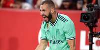 Benzema comemora o gol da vitória sobre o Sevilla (Foto: CRISTINA QUICLER / AFP)  Foto: Lance!