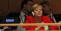 Merkel não chegou a reagir de forma efusiva ao discurso do presidente brasileiro  Foto: Brendan Mcdermid/Reuters / BBC News Brasil