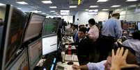  Operadores no escritório da XP Investimentos em São Paulo
10/09/2015
REUTERS/Paulo Whitaker  Foto: Reuters