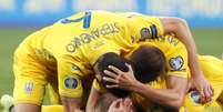 Jogadores da Ucrânia comemoram no final da partida em que o time venceu Portugal por 2 a1, pelo Grupo B das Eliminatórias da Euro 2020, em Kiev. 14/10/2019  REUTERS/Valentyn Ogirenko  Foto: Reuters