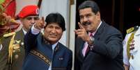 Tanto Evo Morales como Nicolás Maduro são líderes socialistas, mas o resultado de suas políticas econômicas difere bastante  Foto: Getty Images / BBC News Brasil