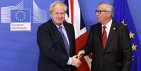 Johnson e Juncker pediram aos parlamentares de ambos os lados apoio ao acordo  Foto: Getty Images / BBC News Brasil