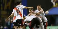 Jogadores do River comemoram a classifica&ccedil;&atilde;o.  Foto: Agustin Marcarian / Reuters