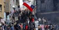 Manifestações, que já adiaram duas rodadas do Campeonato Chileno, suspenderam também partidas entre dias 31/10 e 4/11  Foto: AFP / LANCE!