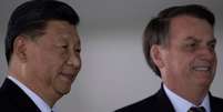 Bolsonaro em reuni&atilde;o com Xi Jinping em Bras&iacute;lia, em 14 de novembro; China &eacute; "cada vez mais parte do futuro do Brasil", disse ele  Foto: EPA / BBC News Brasil