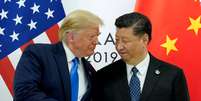 O presidente dos EUA, Donald Trump, se encontra com o presidente da China, Xi Jinping, no início de sua reunião bilateral na cúpula dos líderes do G20 em Osaka, Japão. 29/06/2019. REUTERS/Kevin Lamarque  Foto: Reuters