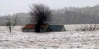 Casa inundada pelas águas do Rio Mondego, na vila de Montemor-O-Velho, em Portugal  Foto: DW / Deutsche Welle