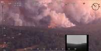 Vista aérea mostra imensas manchas de fumaça oriundas de incêndios na Áustrália. 4/1/2020. NSW Rural Fire Service via REUTERS    Foto: Reuters