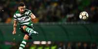 Meia português tem 13 gols e 13 assistências pelo Sporting na temporada (AFP)  Foto: Lance!