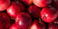 Até no 'berço' das maçãs silvestres, variedades estrangeiras e conhecidas pela forte cor vermelha estão sendo cultivadas  Foto: Getty Images / BBC News Brasil